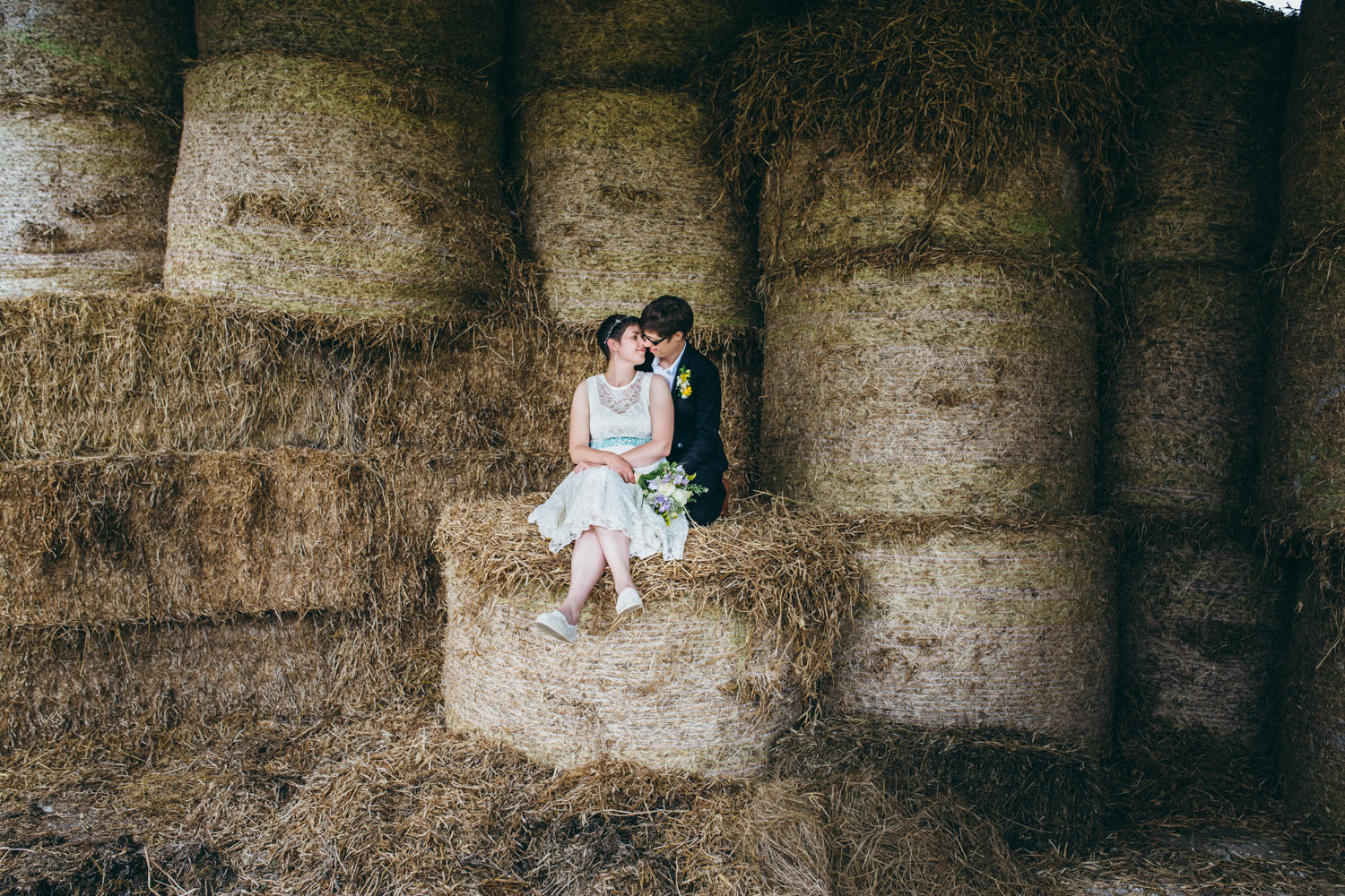 Brighton couple wedding portrait on hay bales